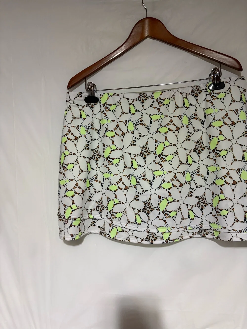 Cross court Floral Cutout Tennis Skort in White with Neon Yellow Accents
